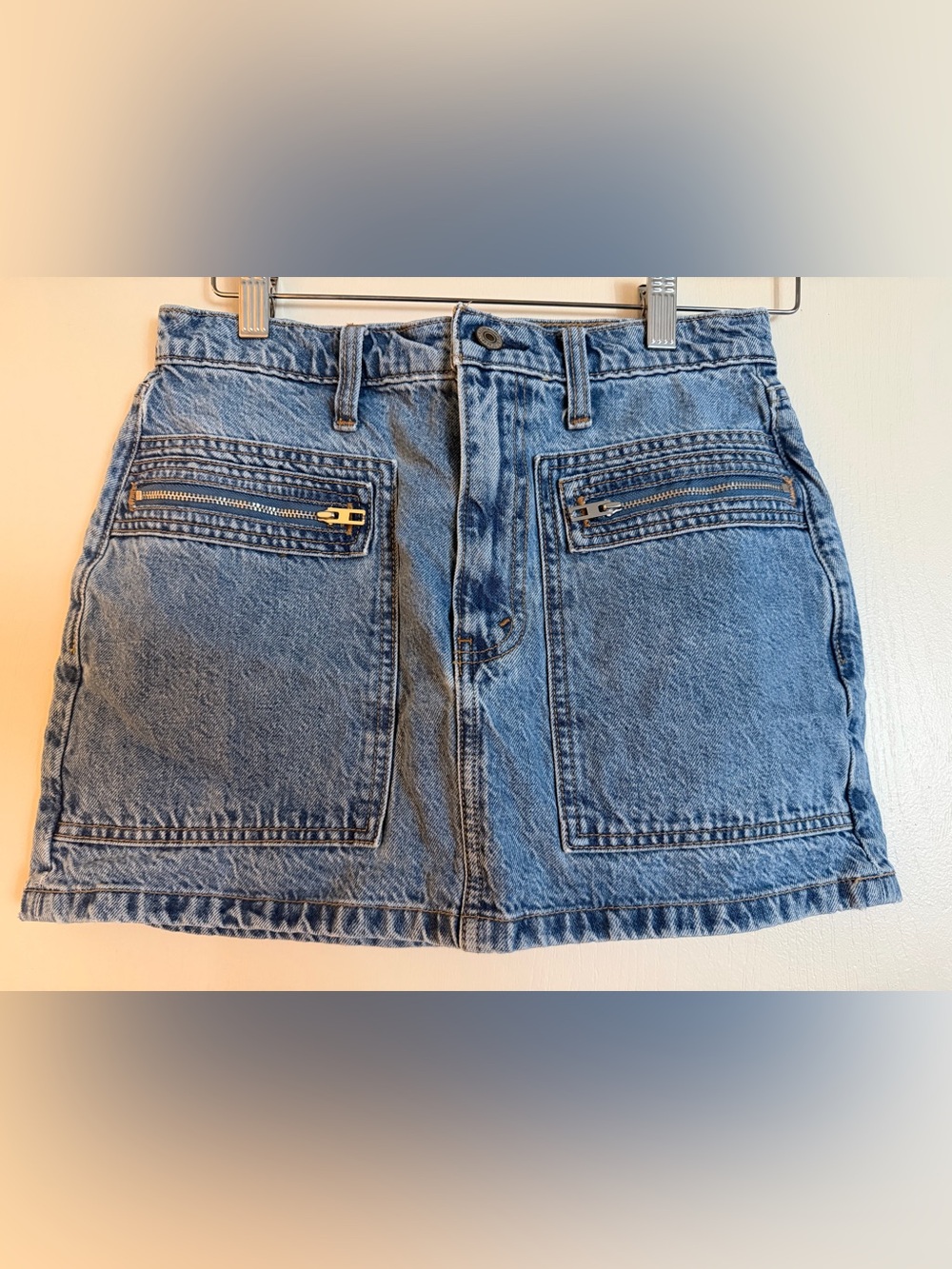 Women’s High Rise Blue Denim Skirt with Front Zip Pockets